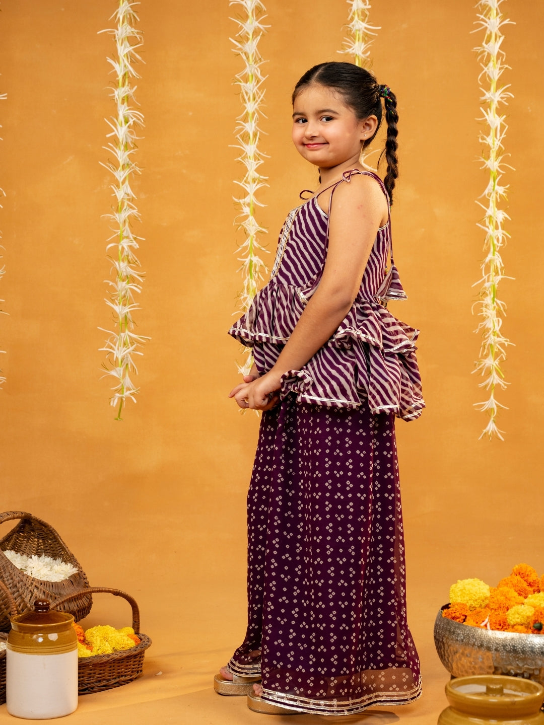 Purple Bandhni and Leheriya Printed Tie-Up Straps Peplum Top and Flared Palazzo (Set of 2)