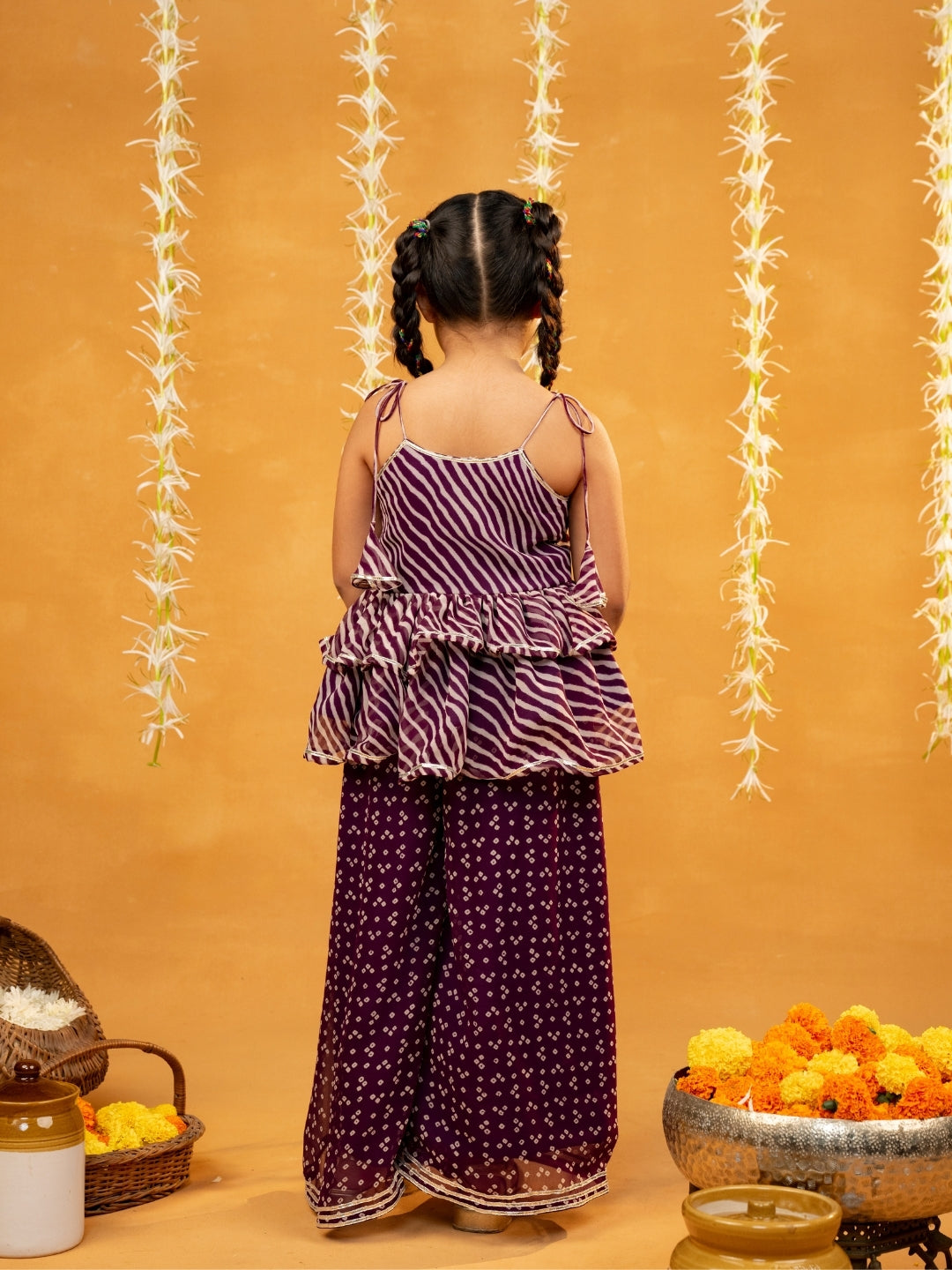 Purple Bandhni and Leheriya Printed Tie-Up Straps Peplum Top and Flared Palazzo (Set of 2)