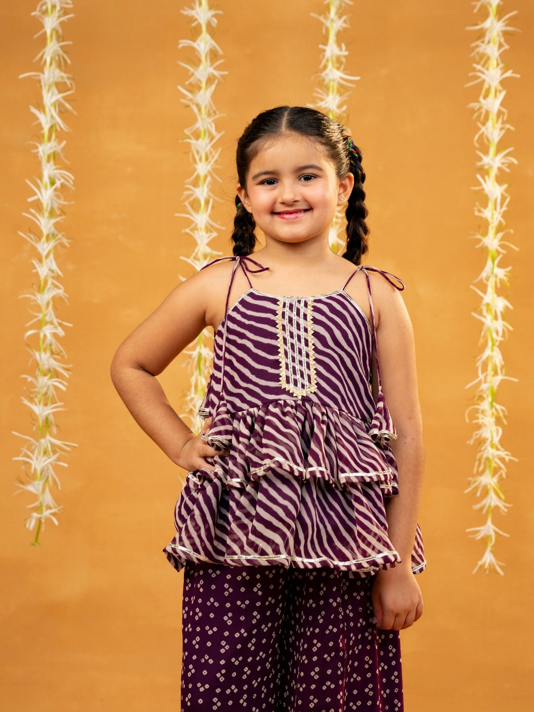 Purple Bandhni and Leheriya Printed Tie-Up Straps Peplum Top and Flared Palazzo (Set of 2)