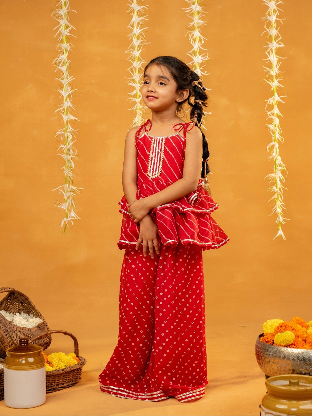 Red Bandhni and Leheriya Printed Tie-Up Straps Peplum Top and Flared Palazzo (Set of 2)
